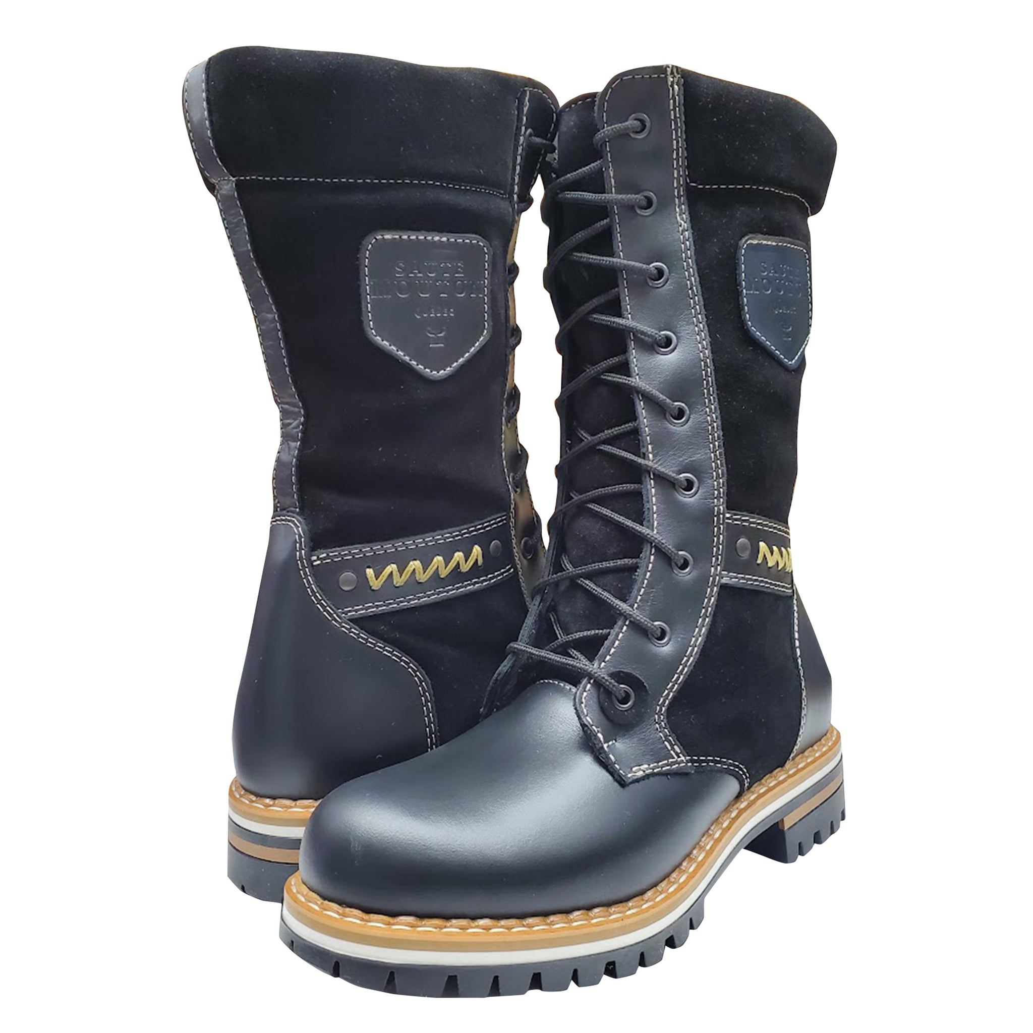 Pair of blue work boots with brown soles on a white background
