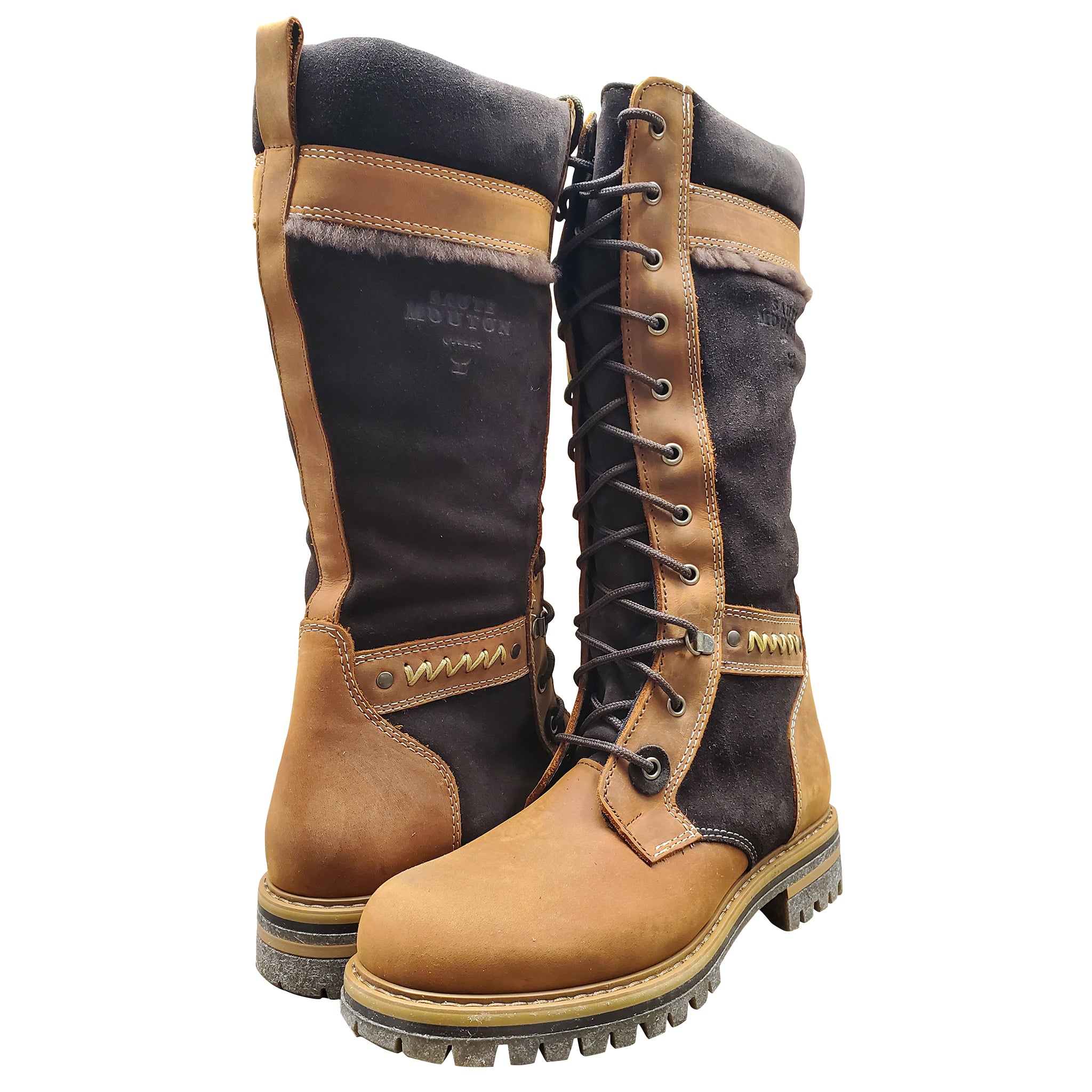 Pair of brown and black work boots on a white background