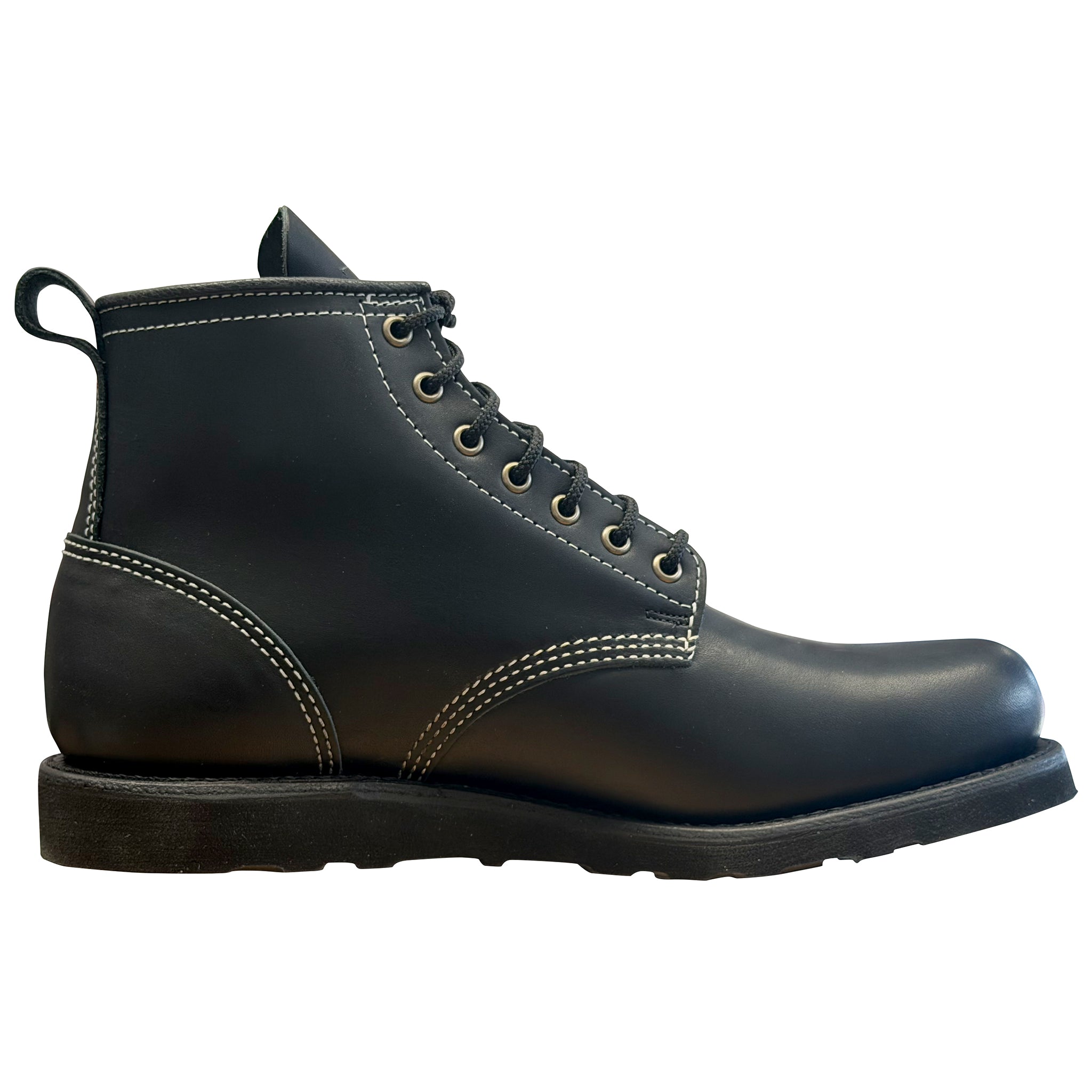 Black leather boot on a white background