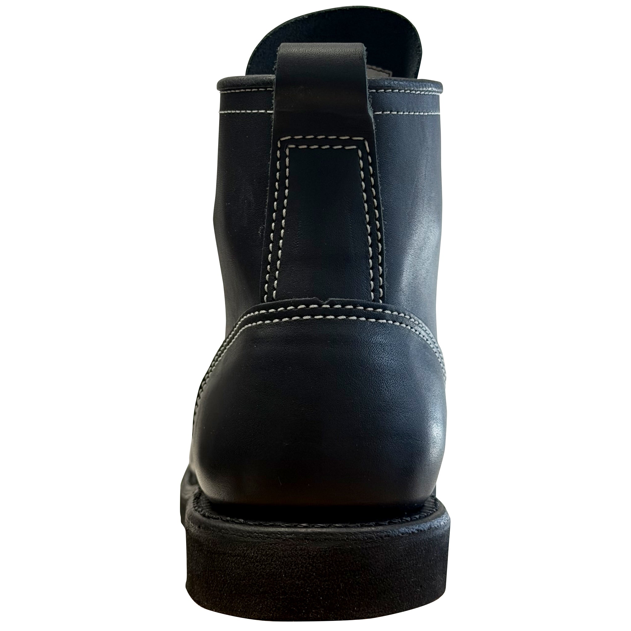 Black leather boot sole on a white background