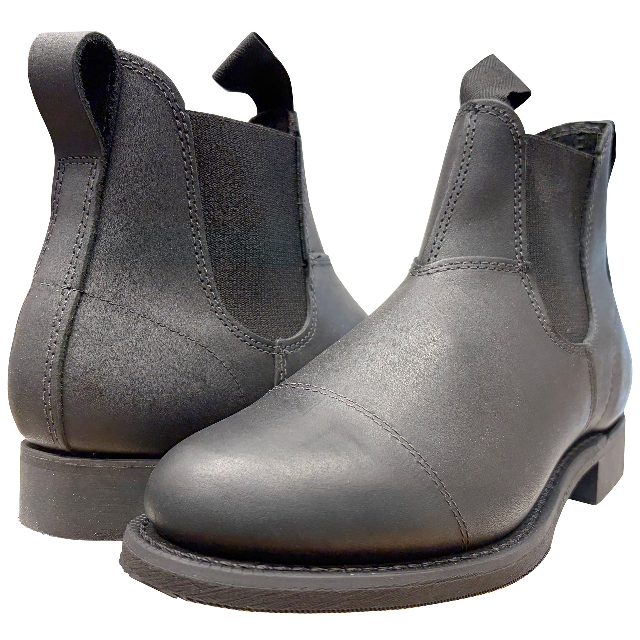 Pair of gray leather boots with elastic sides on a white background