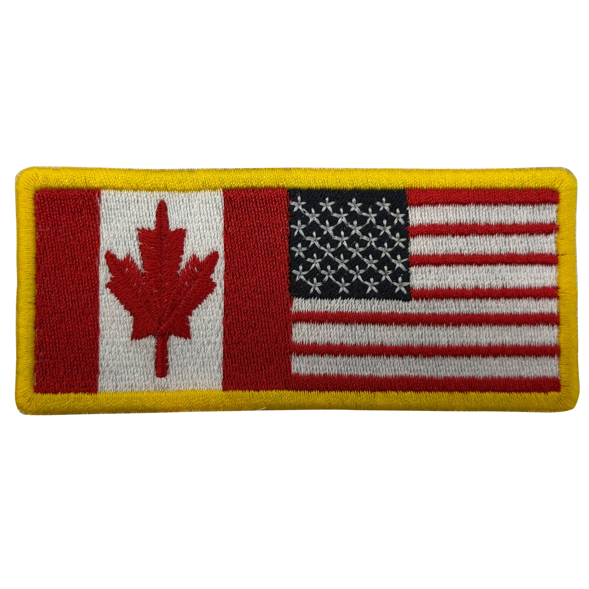 Embroidered patch with American and Canadian flags on a white background