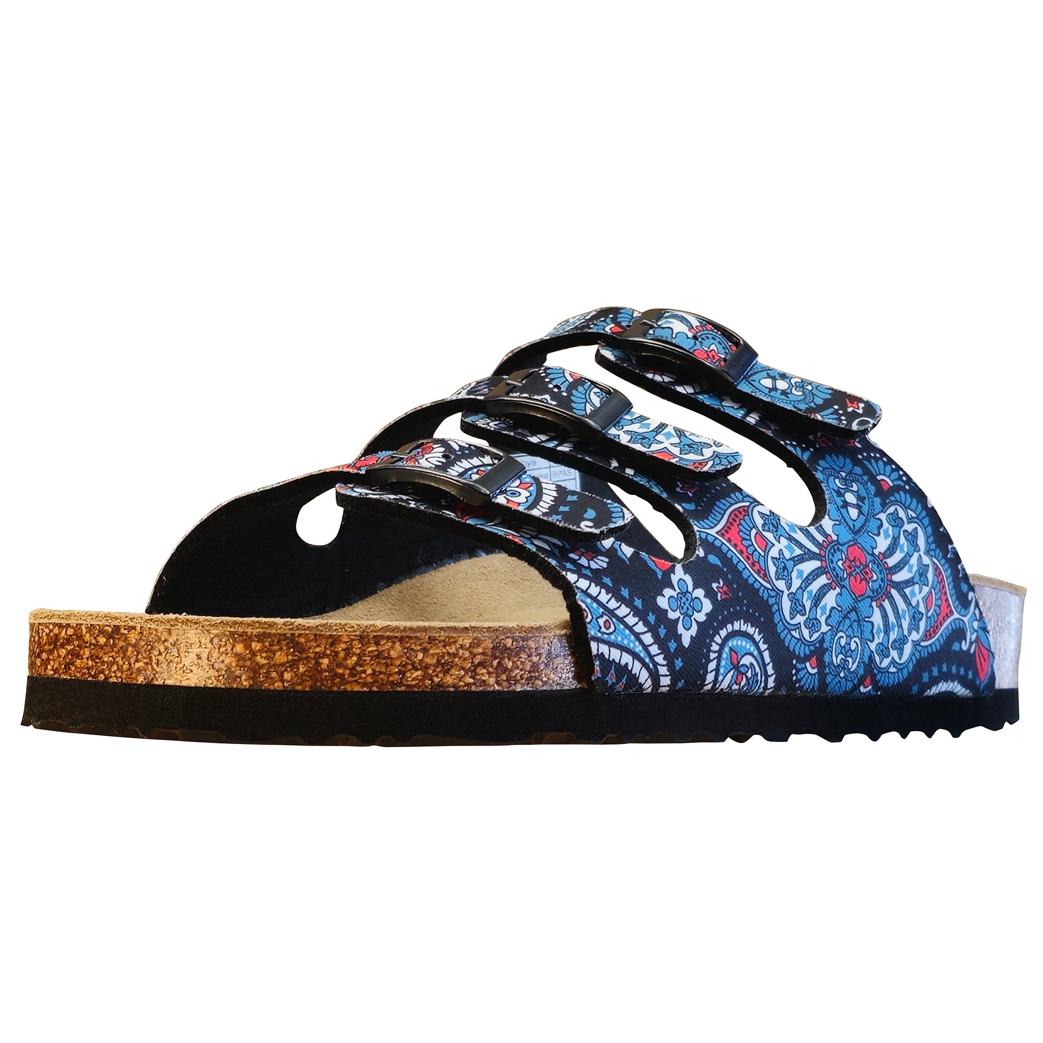 A single slide sandal with a blue, red, and white paisley patterned upper, black trim, and a cork-textured midsole on a white background.