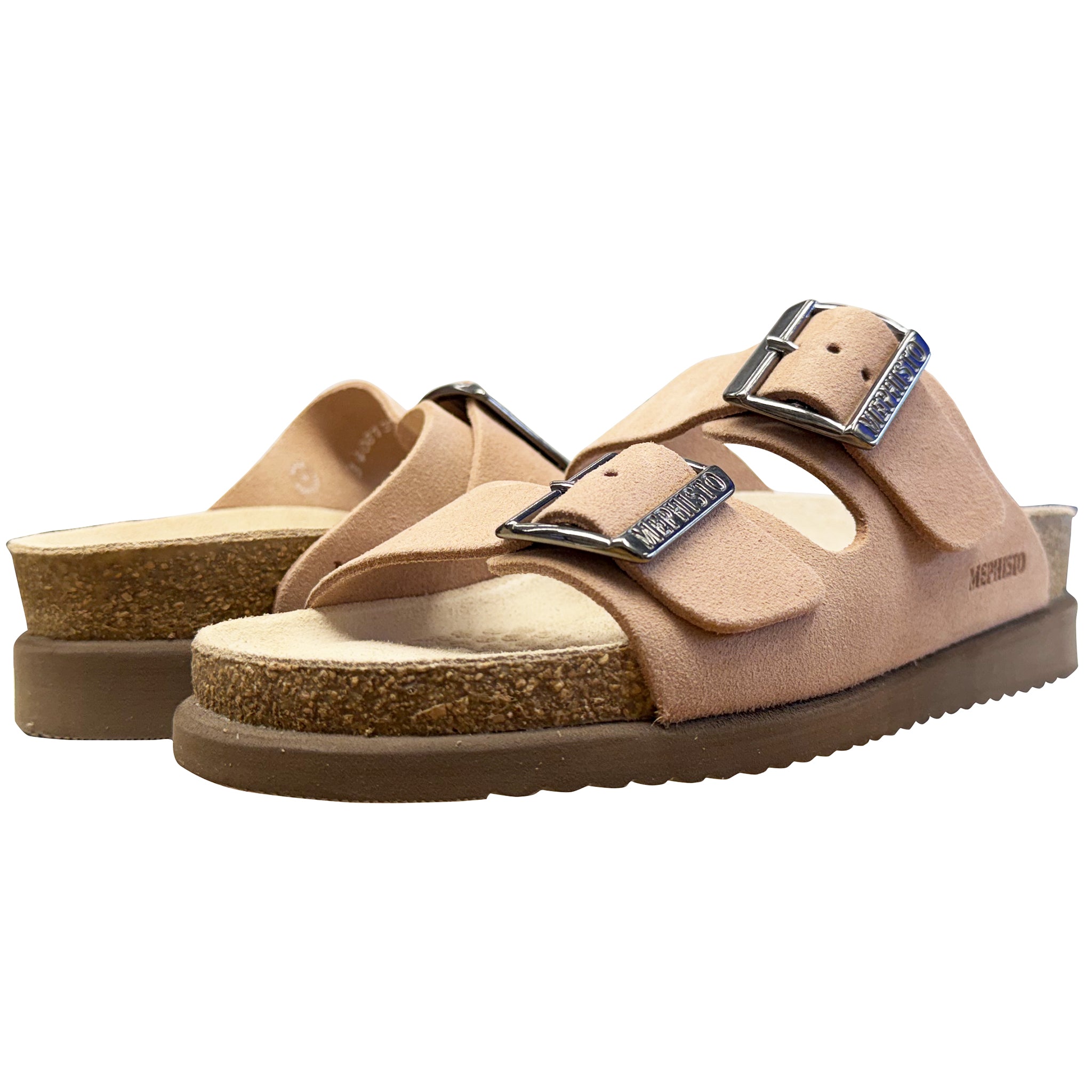 Pair of tan sandals with buckles on a white background