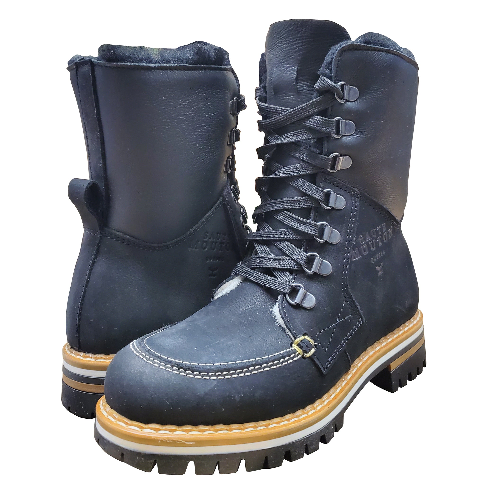 Pair of blue work boots with yellow soles on a white background