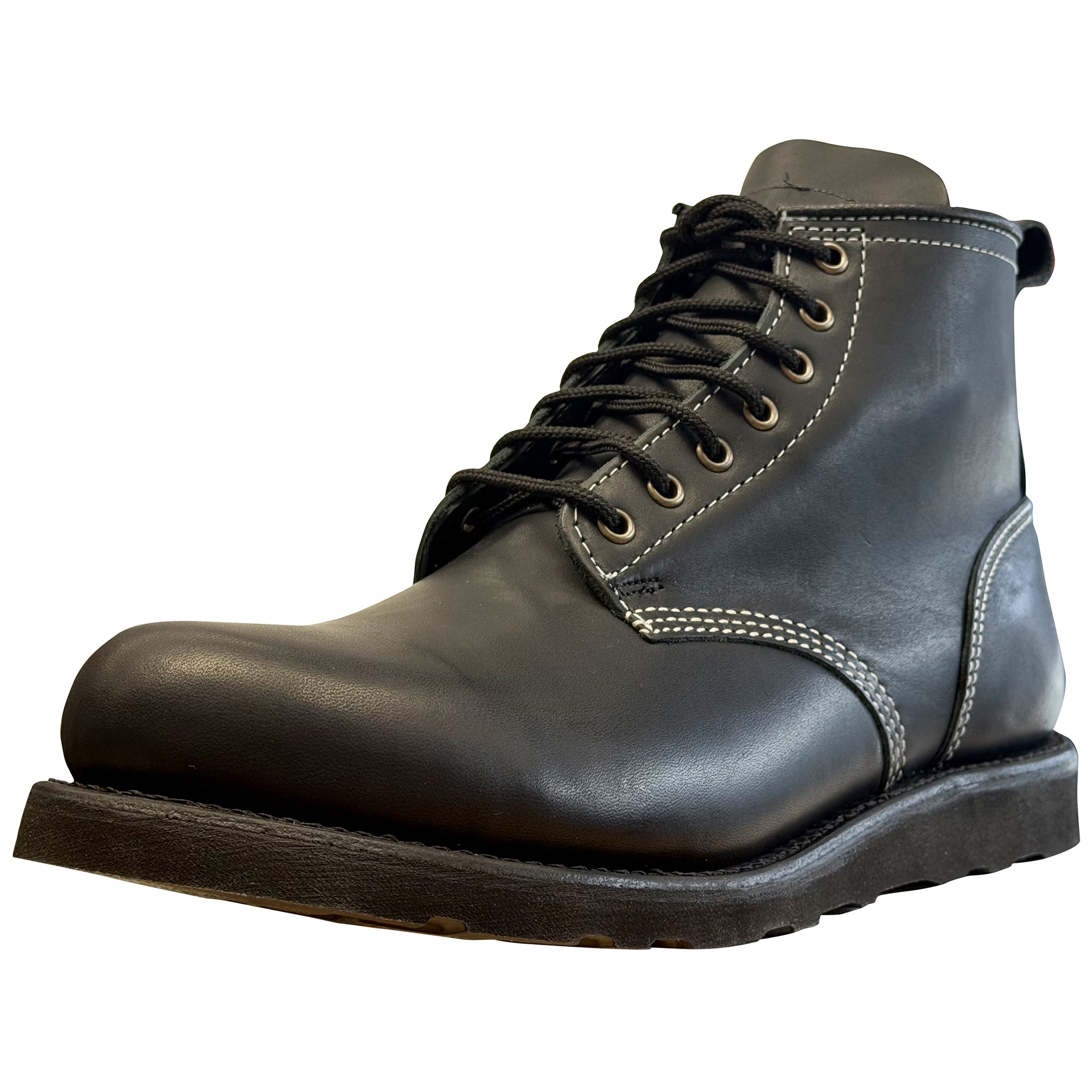 Black leather boot with laces on a white background