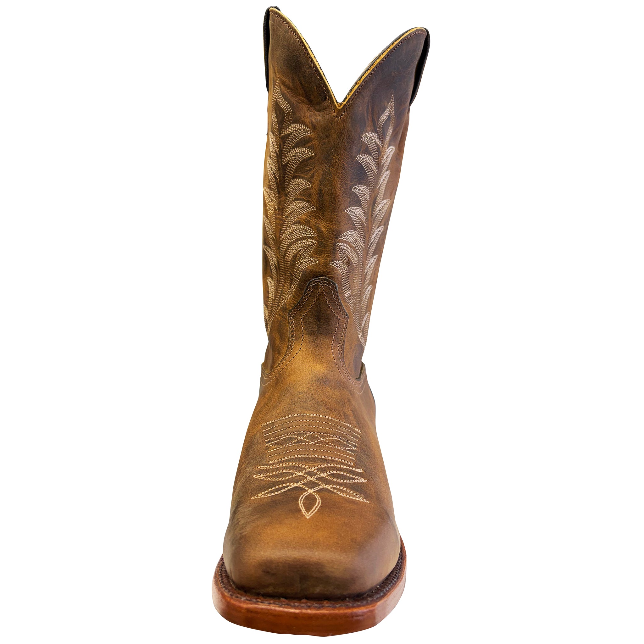 Brown cowboy boot with intricate white embroidery on a white background