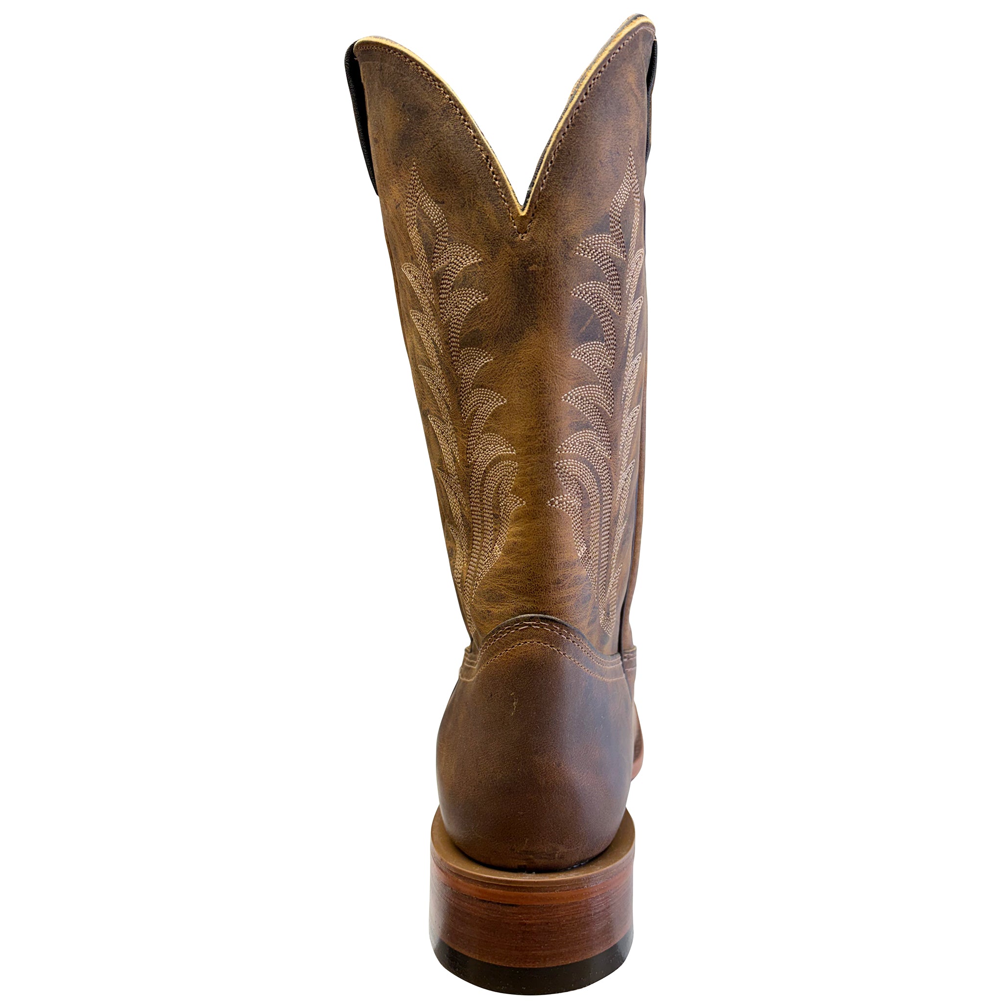 Brown cowboy boot with intricate design on a white background