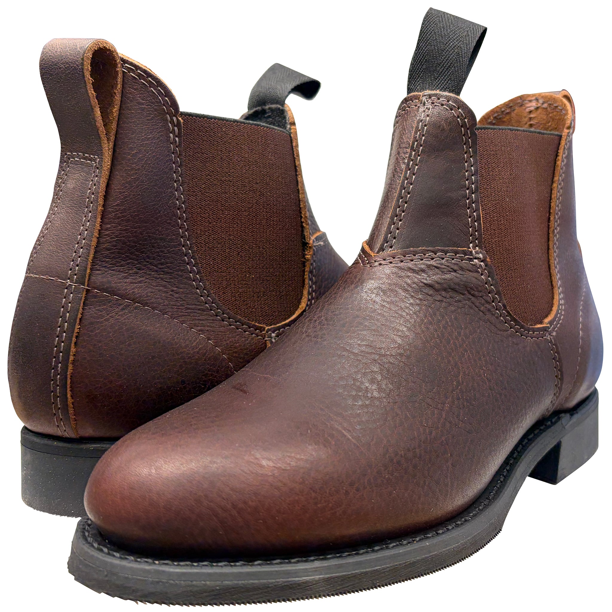 Pair of brown leather boots on a white background