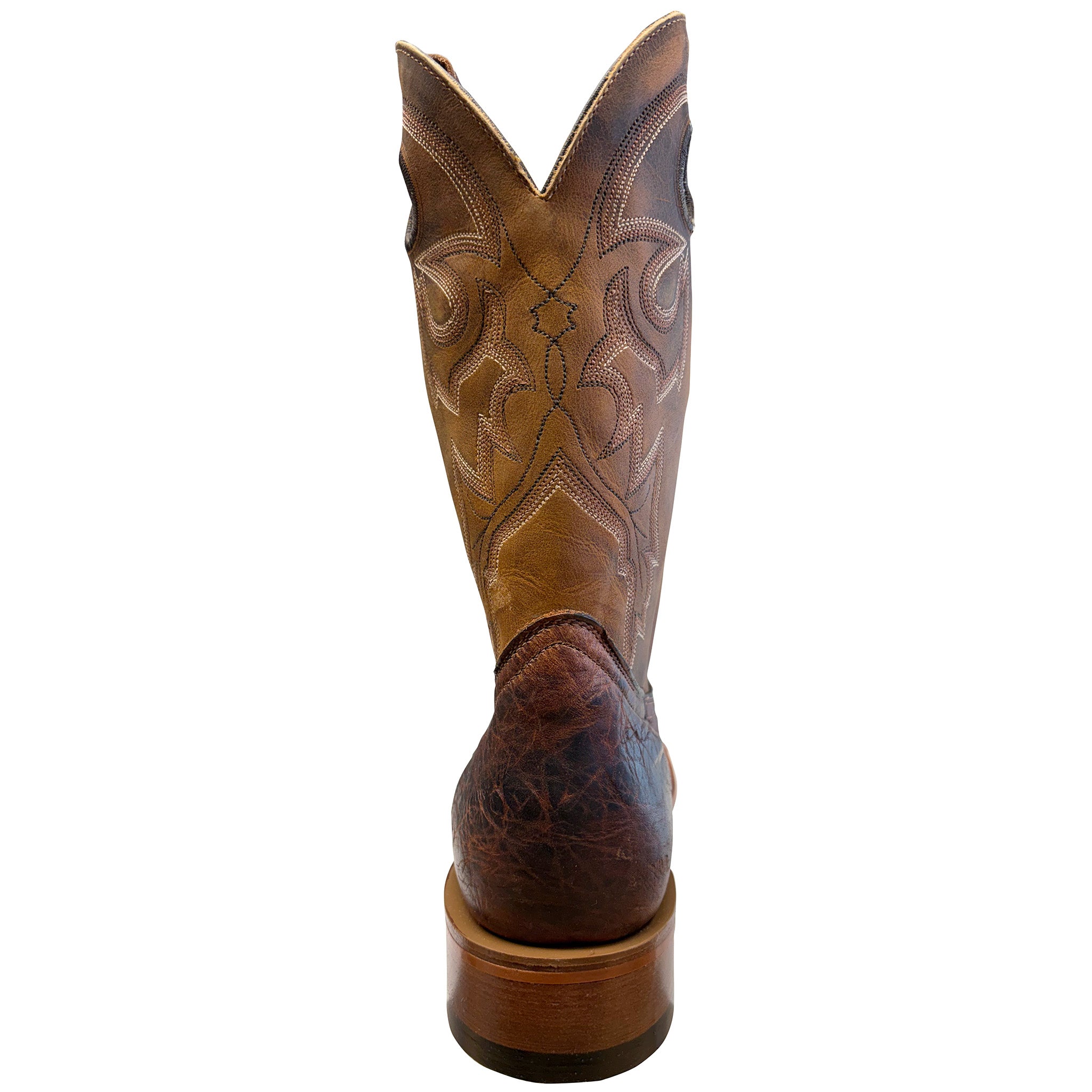 Brown cowboy boot with intricate embossing on a white background