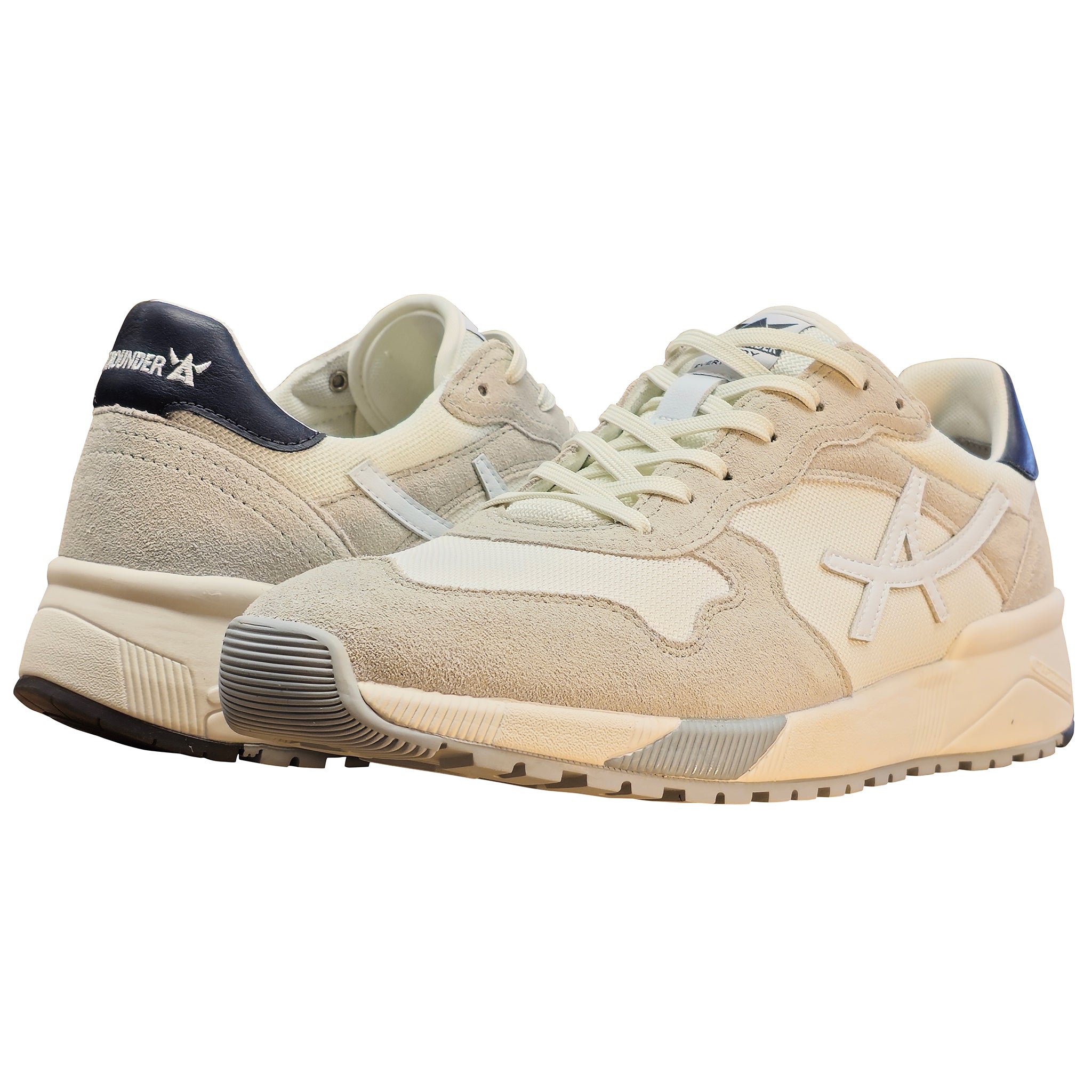Pair of beige sneakers with a brand logo on a white background